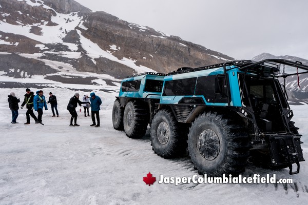 Visitors on the Athabasca Glacier Columbia Icefield Fat Truck Ice Odyssey